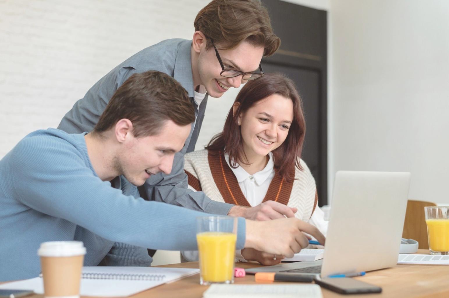 Financial analyst reviewing valuation models on multiple screens